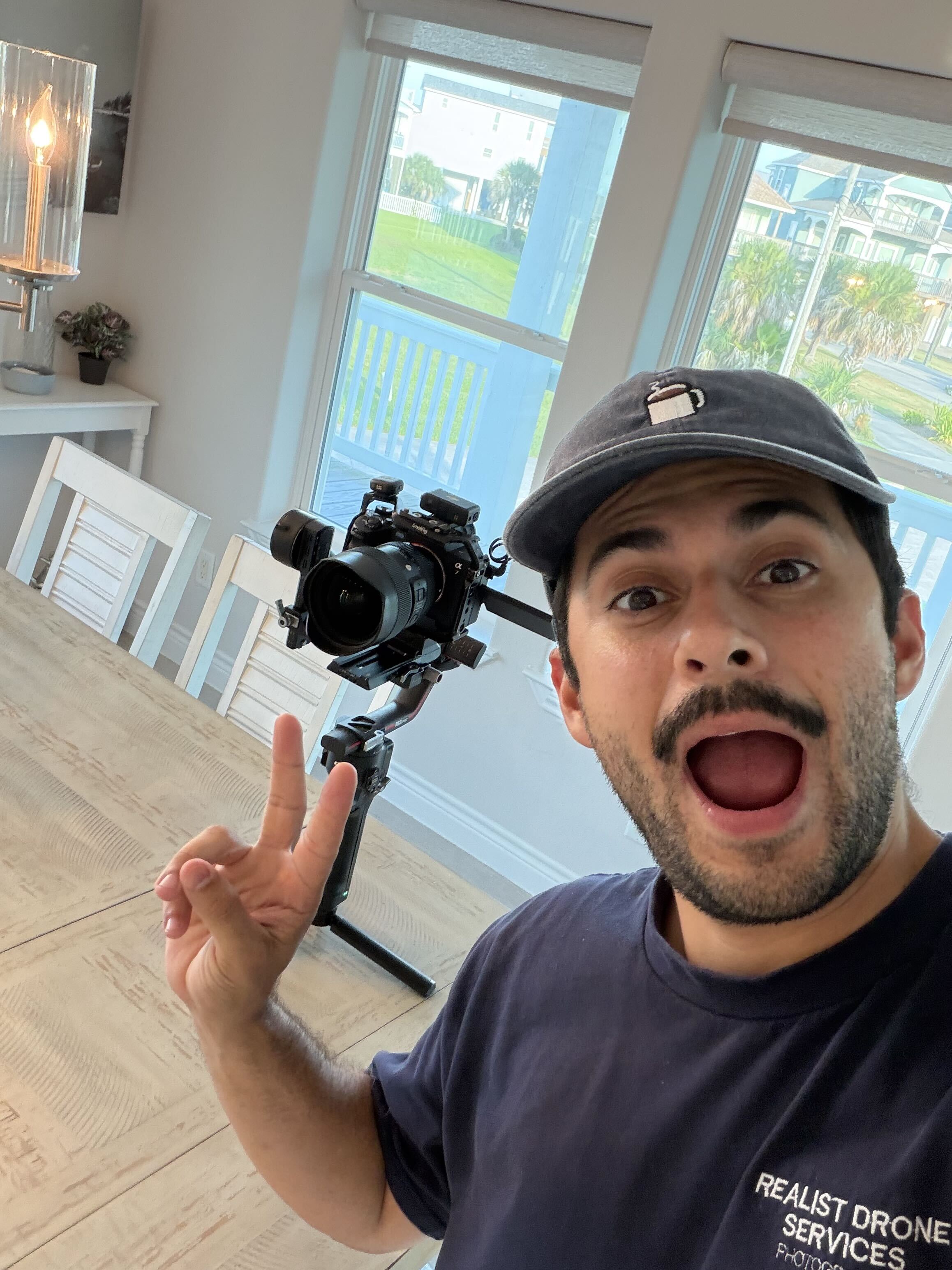 Realist Drone Services photographer capturing real estate photos at a Houston-area home Realist Drone Services photographer capturing real estate photos at a Houston-area home