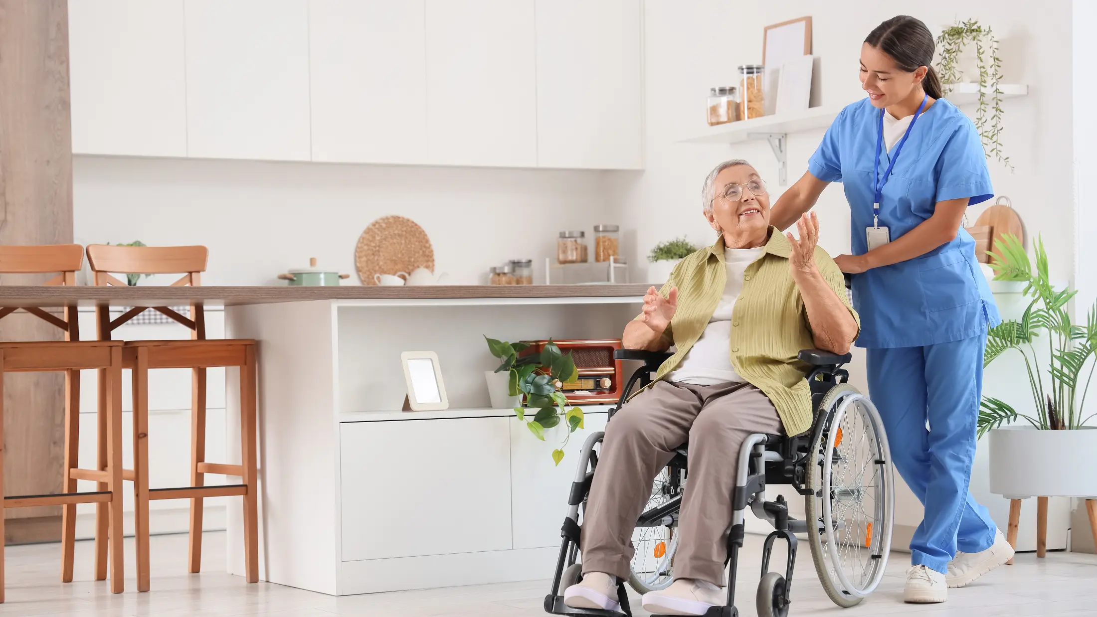 A caregiver from South Bay Home Health Care Agency assisting an older adult at home in Carson, California