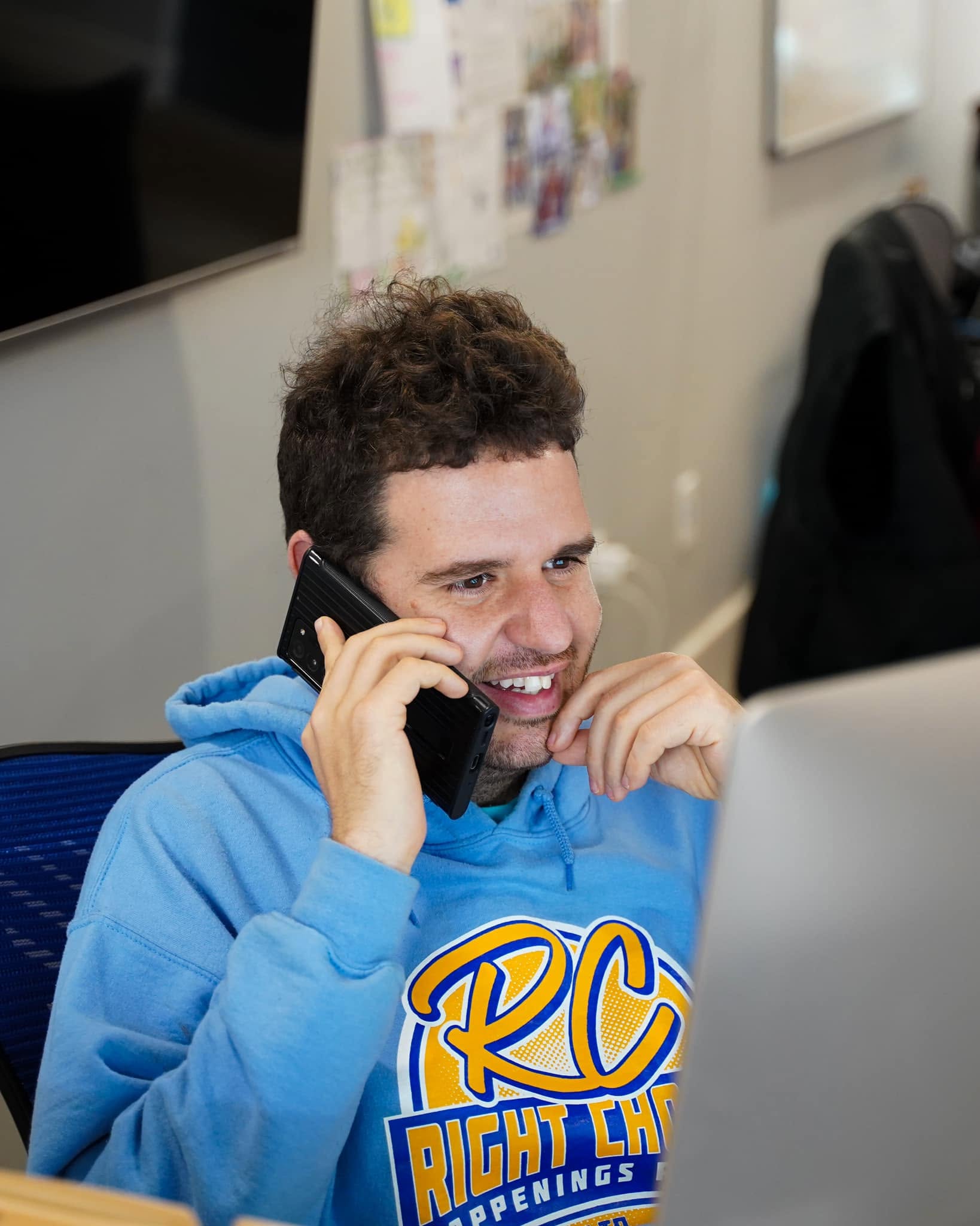 Joe Gonzalez on the phone at the Right Choice office