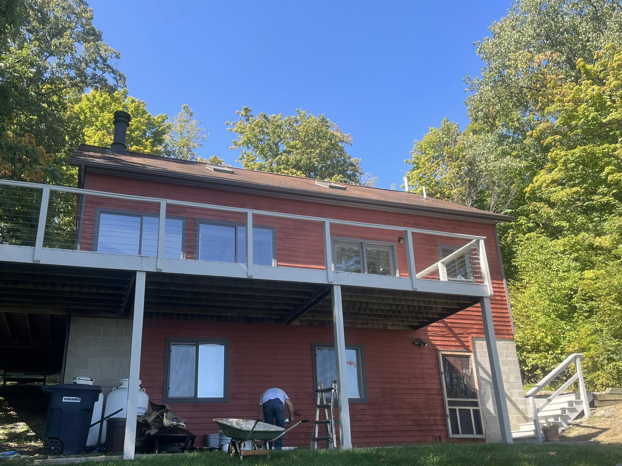 Red house with rear yard work in progress, Watkins Glen