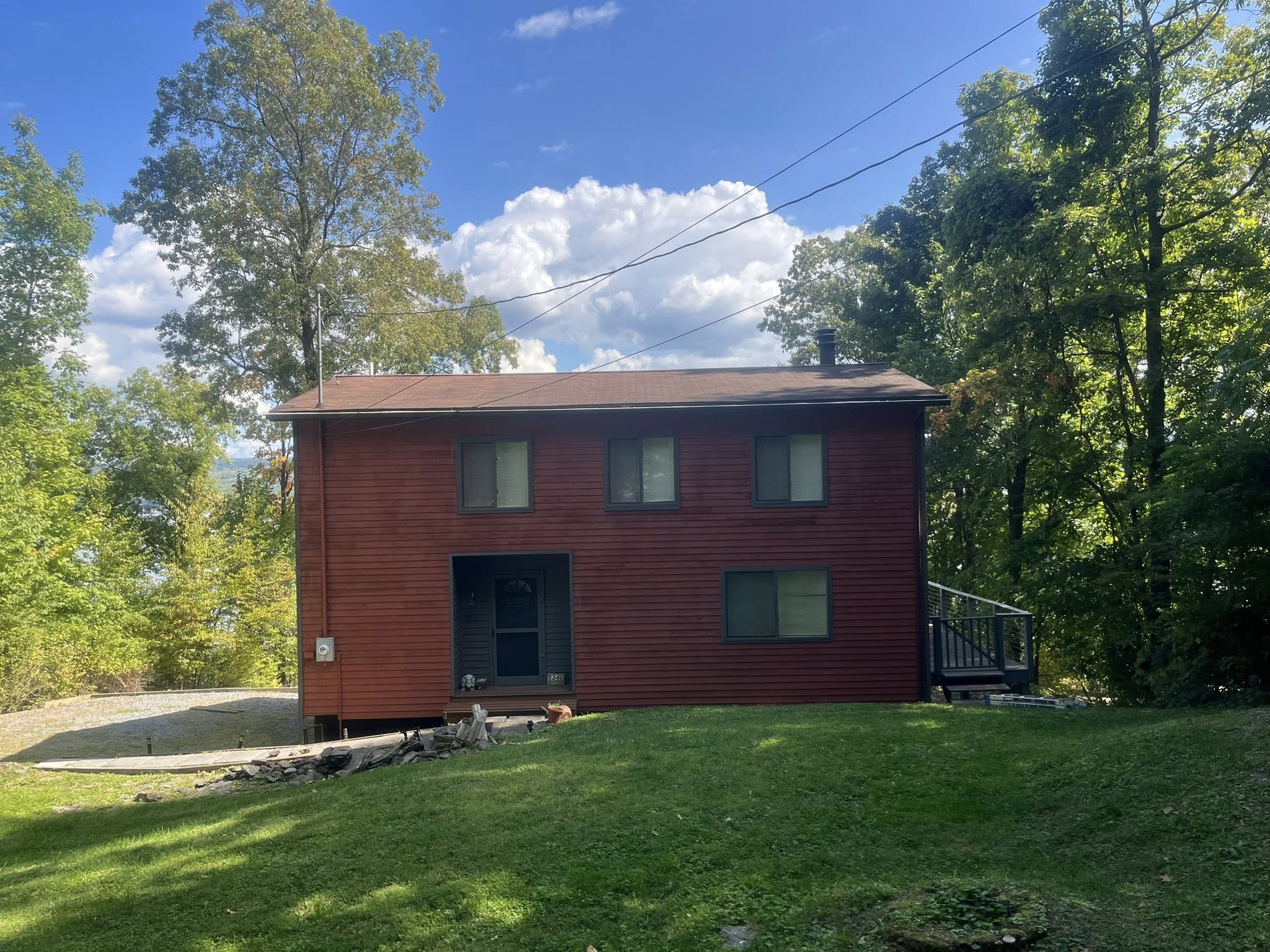 Red house with freshly mowed front lawn, Penn Yan