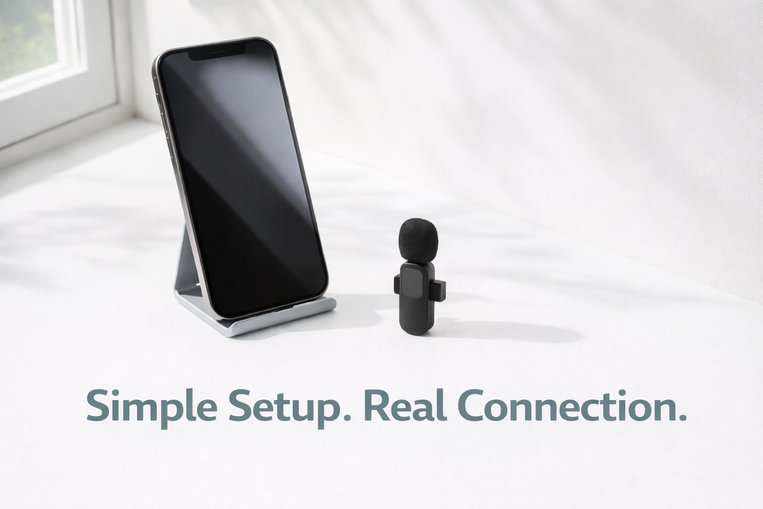 Simple iPhone video setup for coaches and consultants — lavalier mic, phone stand, and natural light is all you need