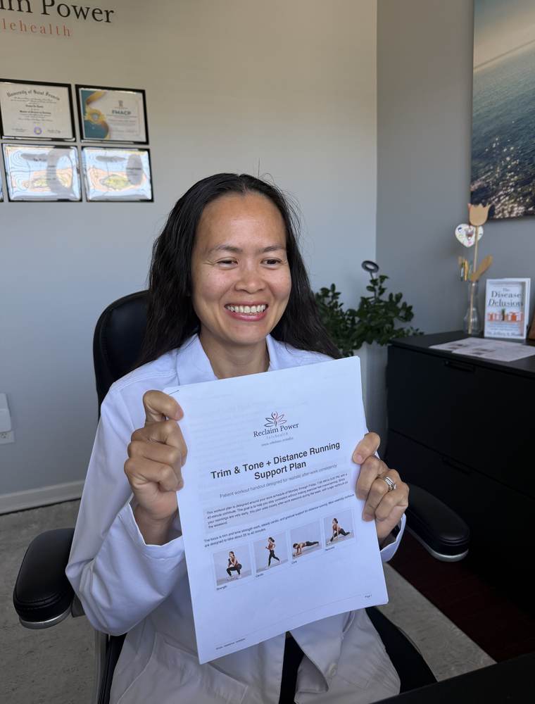 Trang holding a printed Reclaim Power support plan