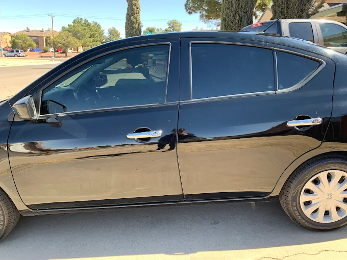 Damaged automotive glass being inspected