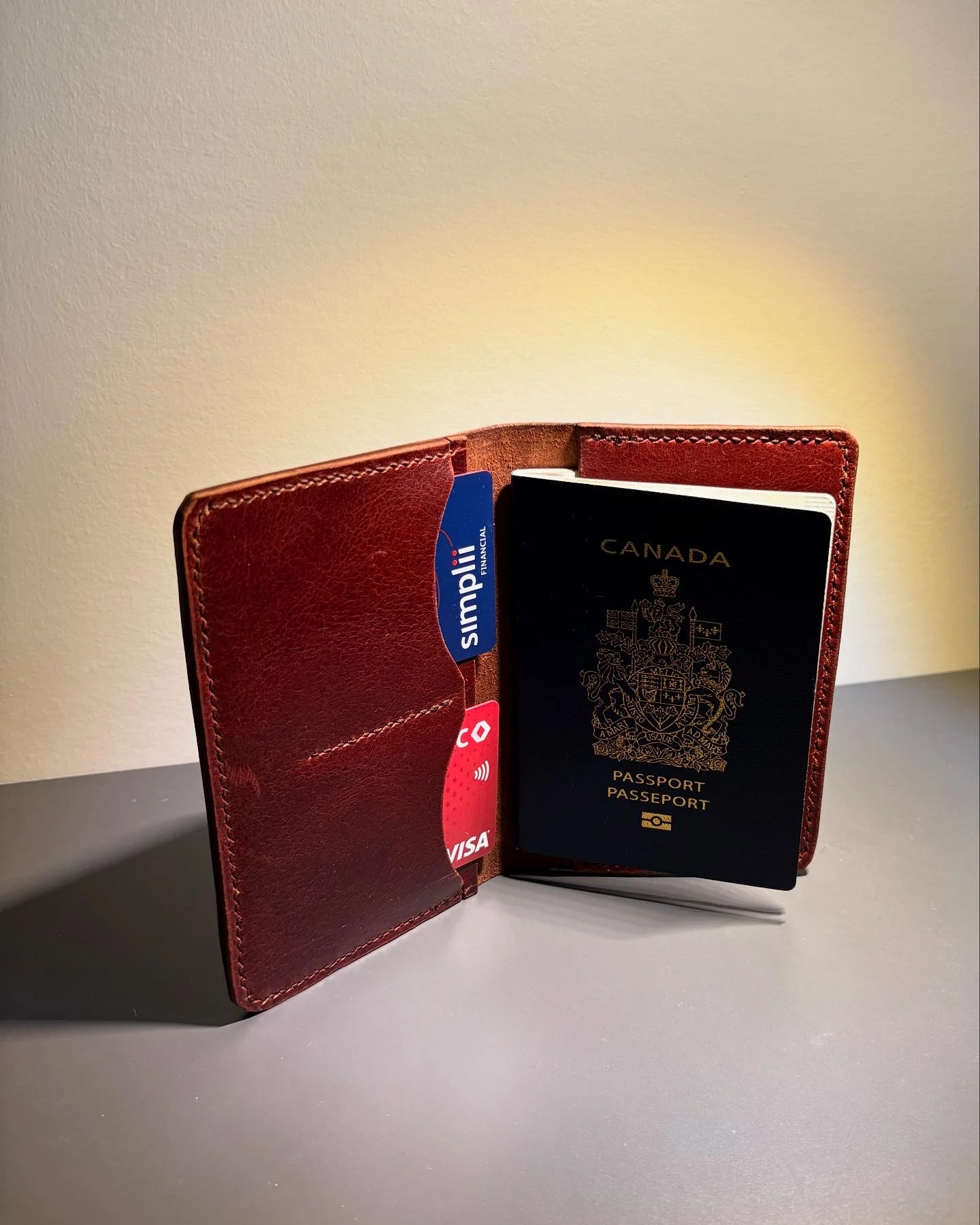 open brown leather passport and card holder by learns leather co