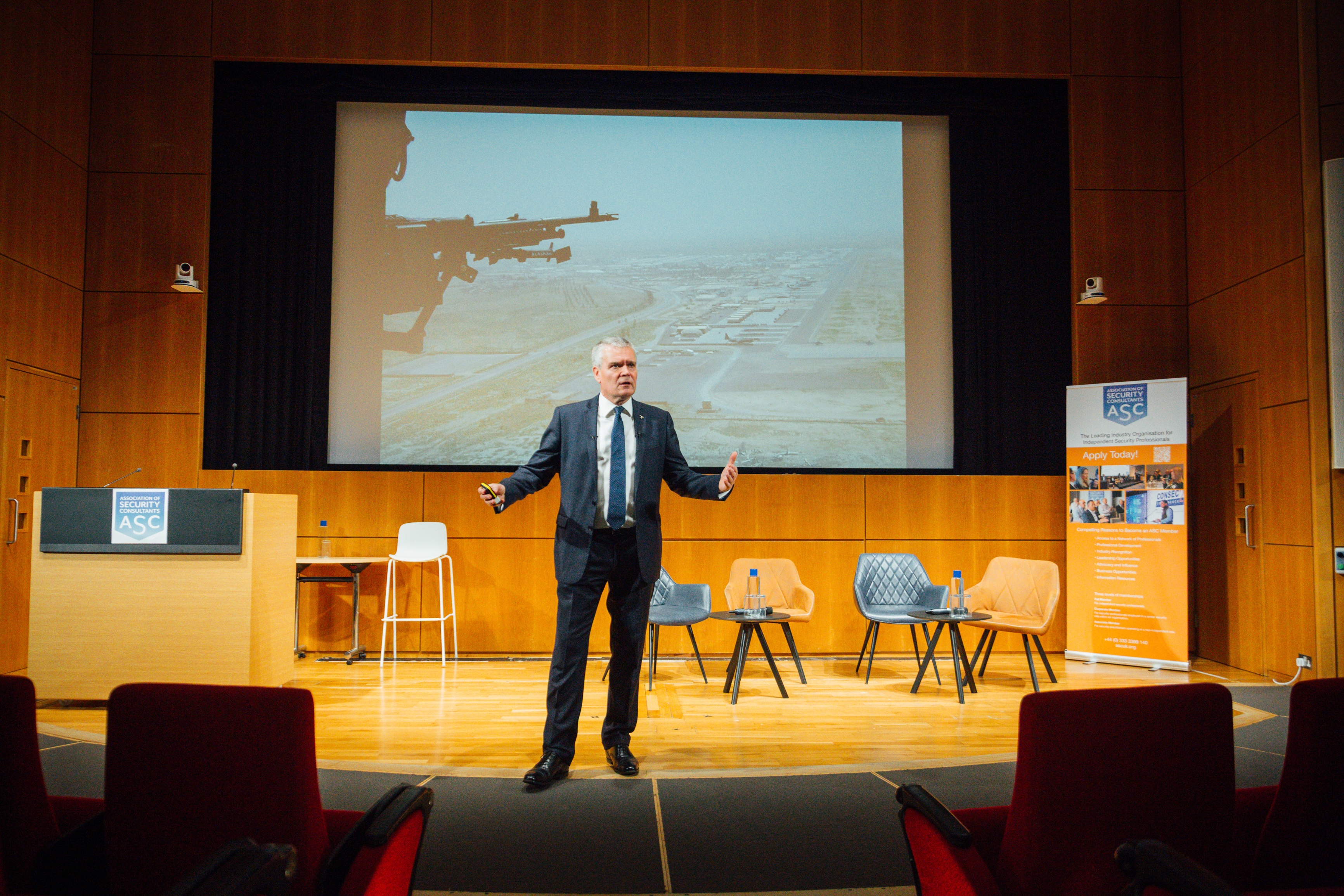 Bob Judson speaking on stage