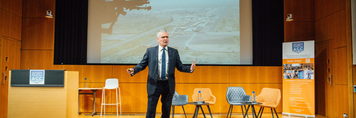 Bob Judson speaking on stage