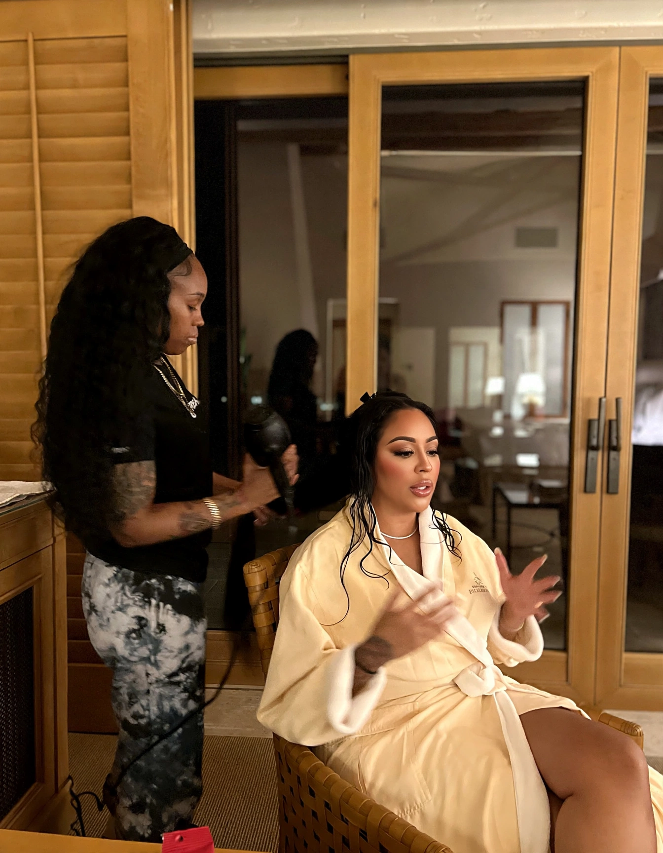 Chelsea in the glam chair while a stylist dries her hair