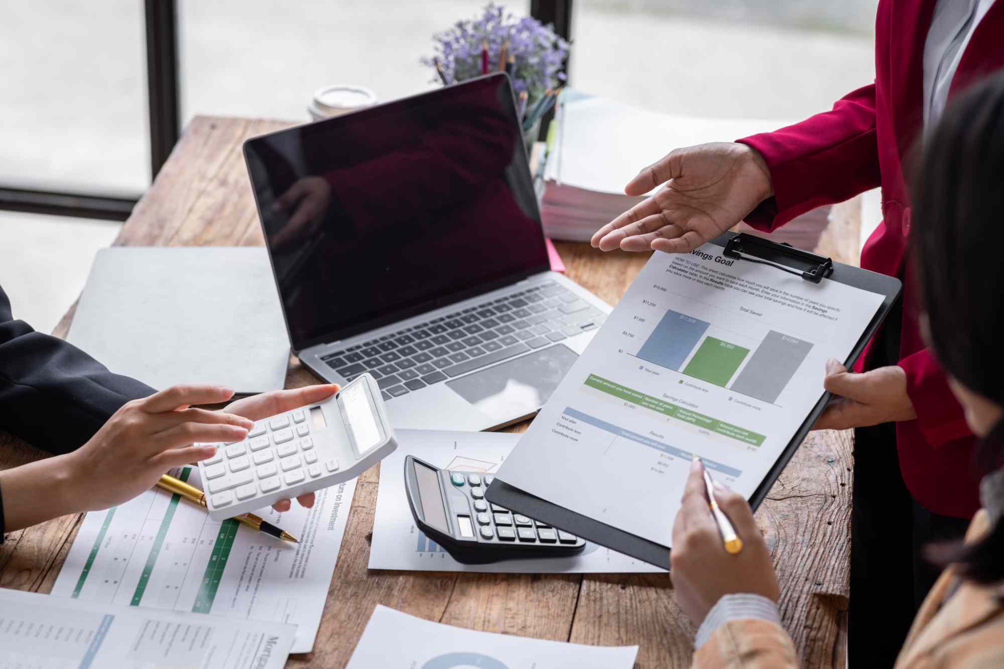Megan Dahl Bookkeeping team reviewing financial reports with a client in Redding, CA