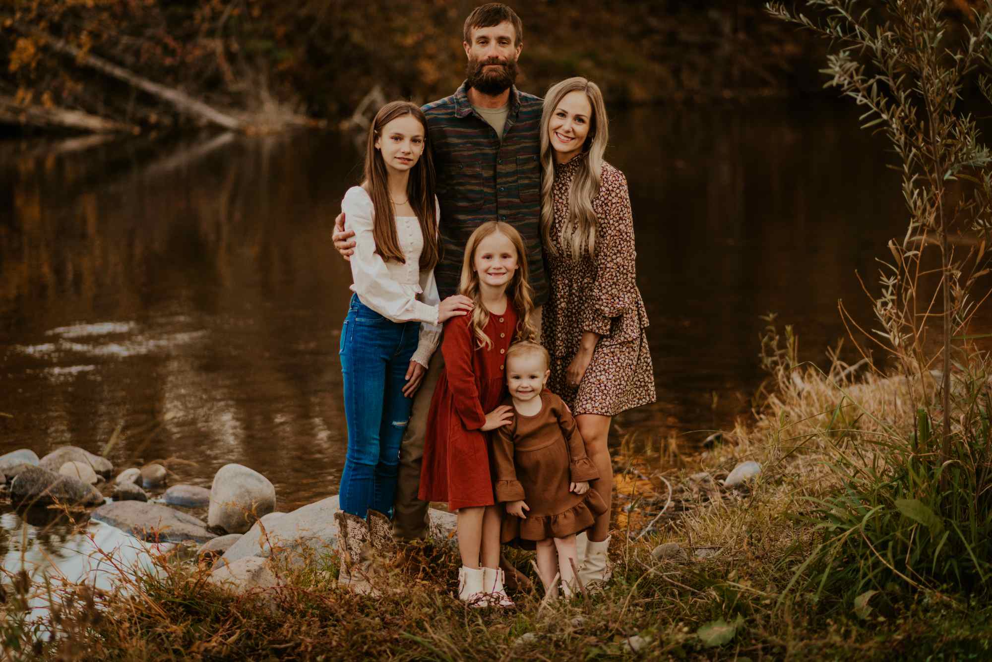 Megan Dahl, Redding bookkeeper, with her family by the Sacramento River