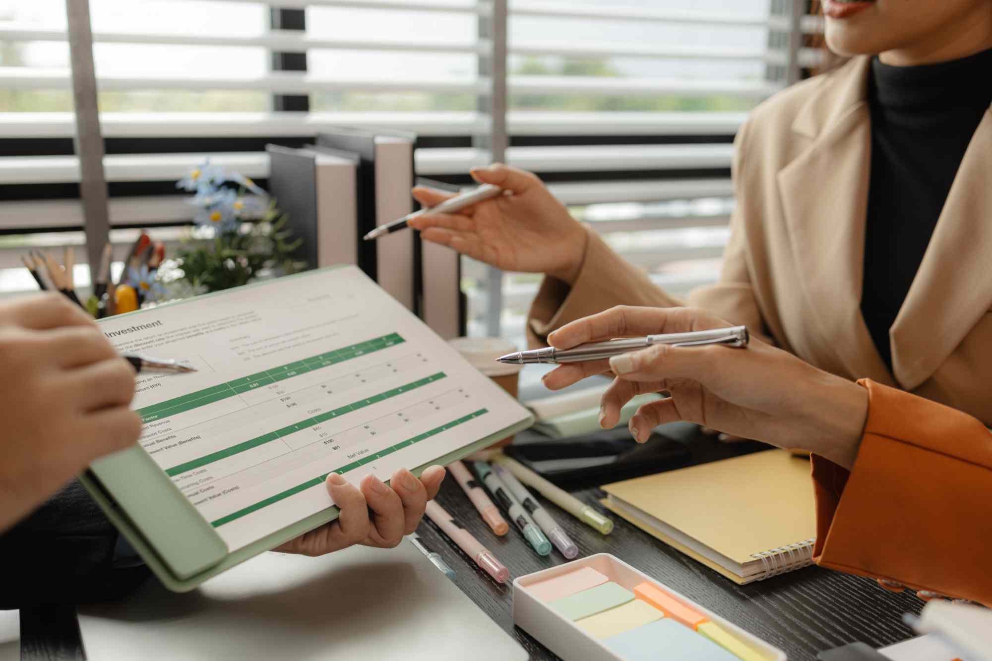 Trusted bookkeeping expertise — Megan Dahl analyzing financial records and spreadsheets