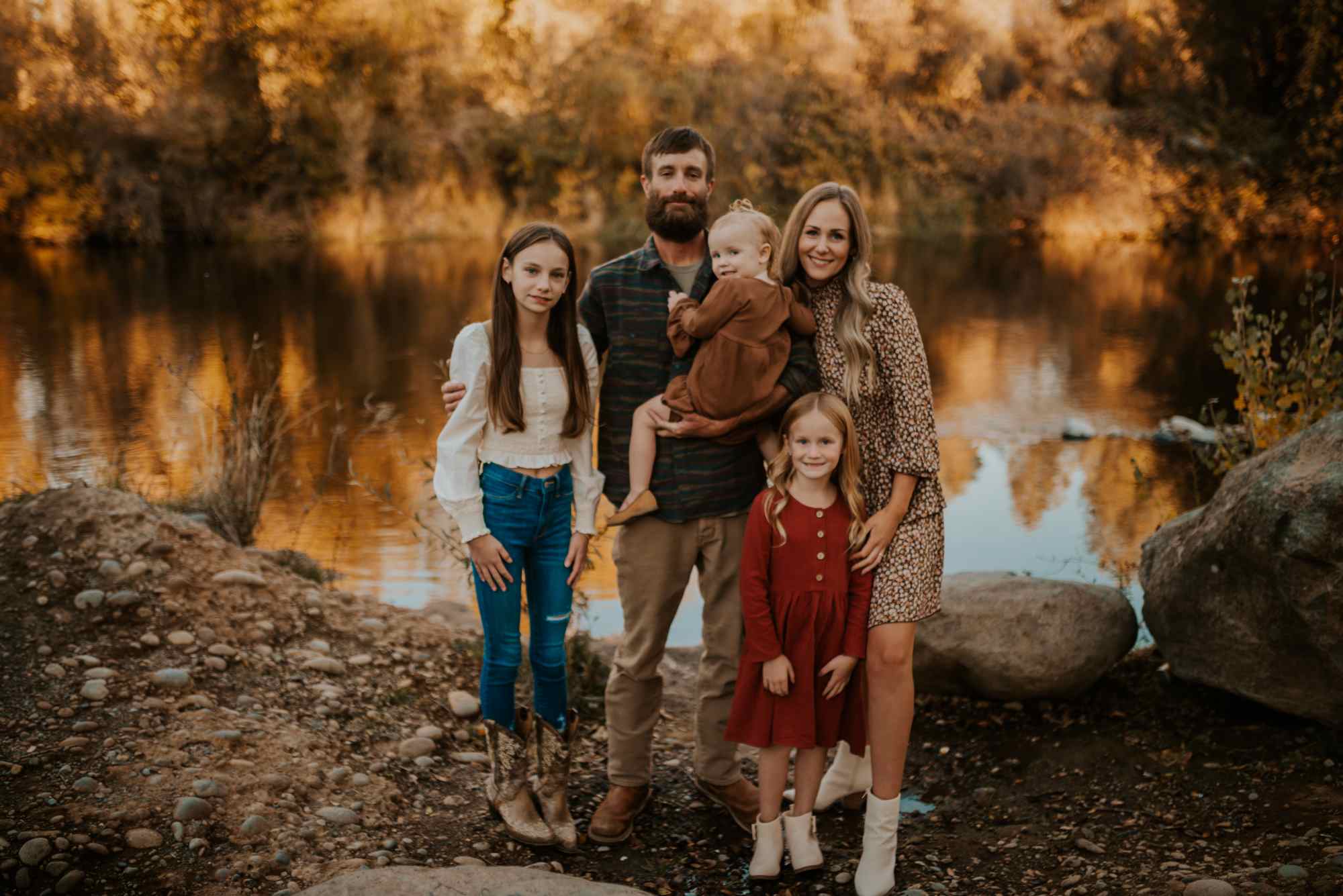 Megan Dahl, Redding bookkeeper, with her family by the Sacramento River