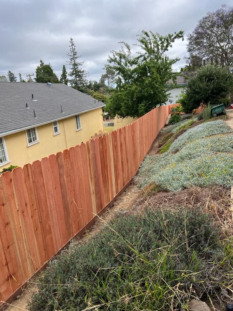Wood fence project by Hermanos Fence
