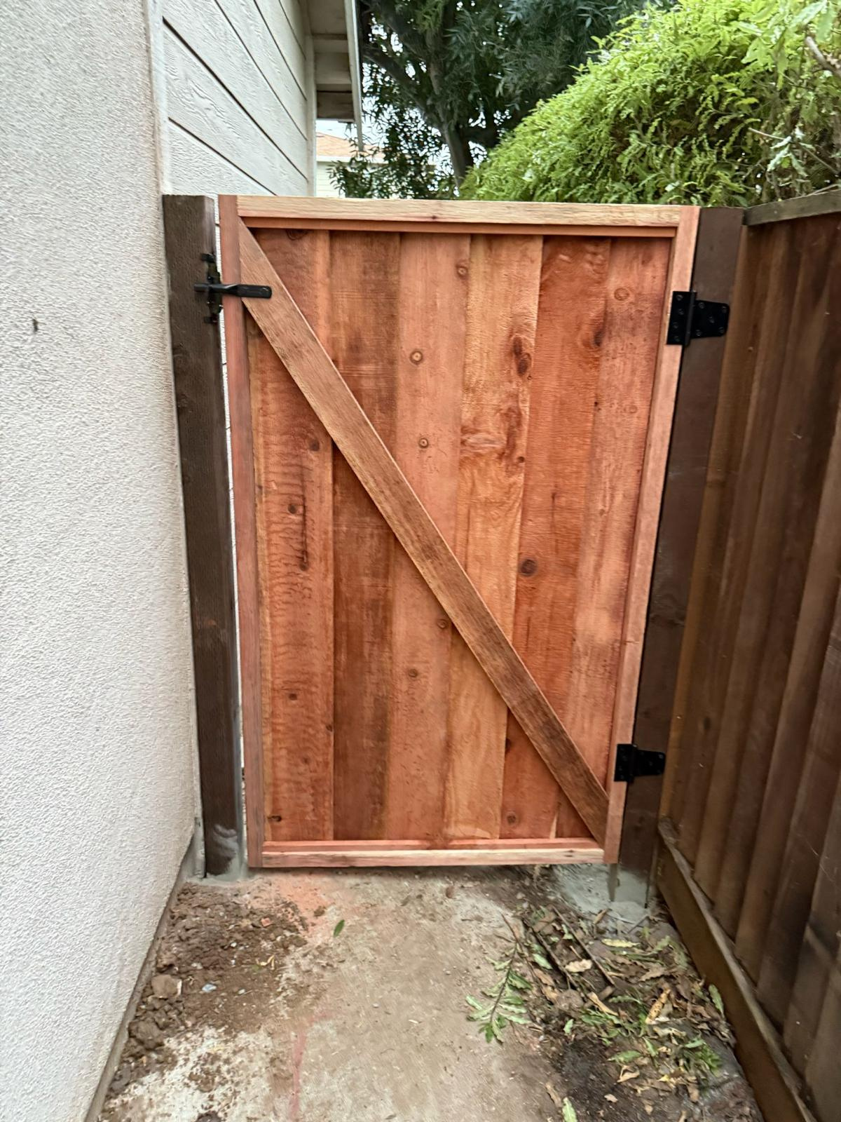 Traditional redwood fence gate style available in Castro Valley