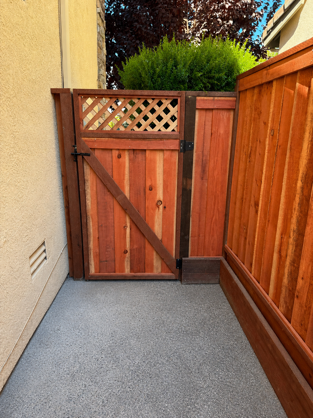 Traditional redwood fence gate style in Hayward California