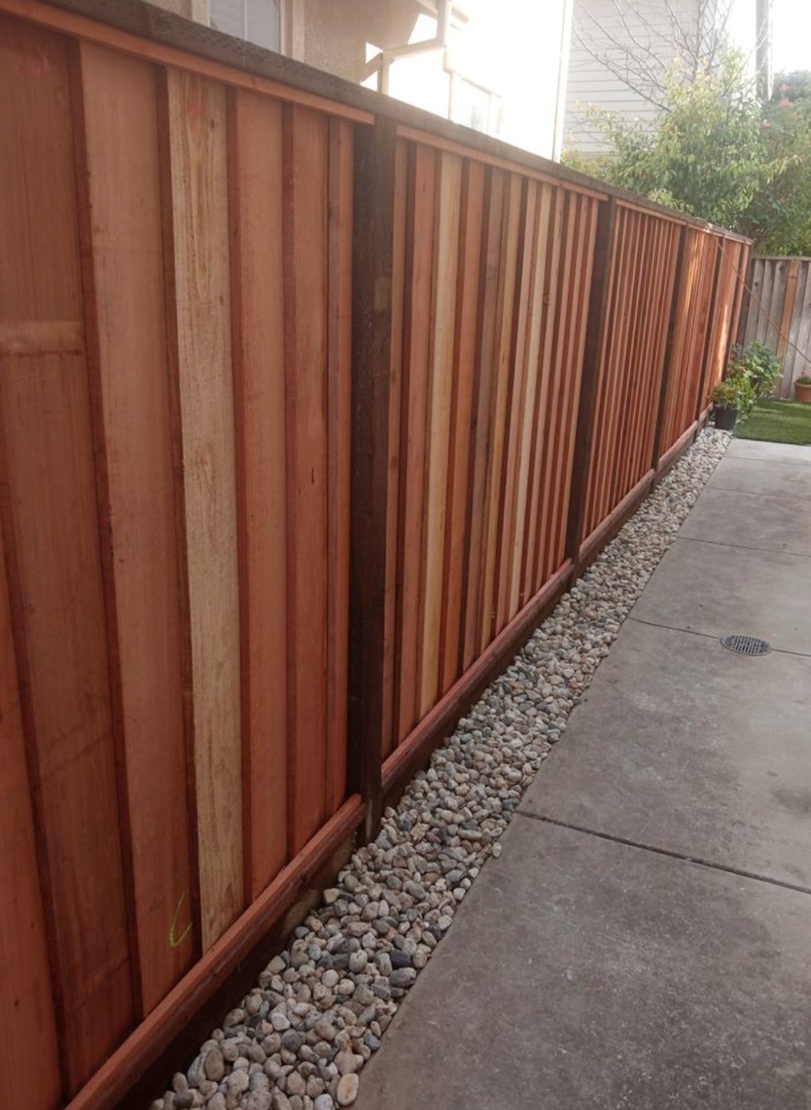 Redwood Board on Board fence installed by Hermanos Fence