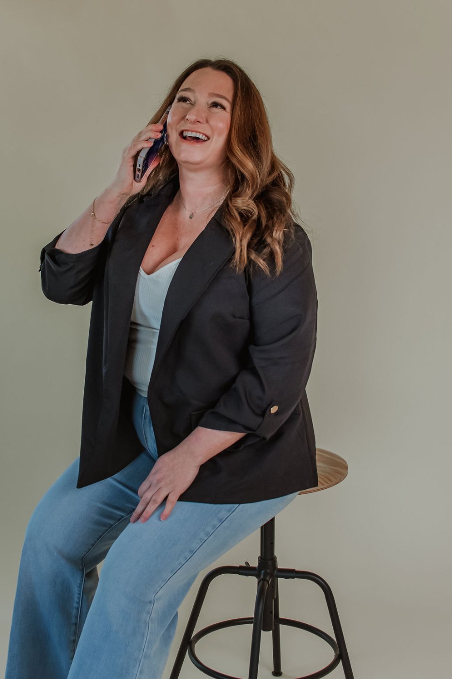 Megan Moore laughing on a phone call