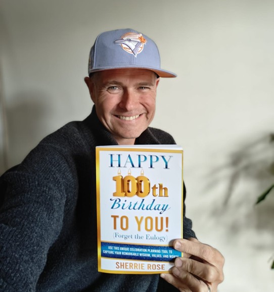 A reader with Happy 100th Birthday to You by Sherrie Rose