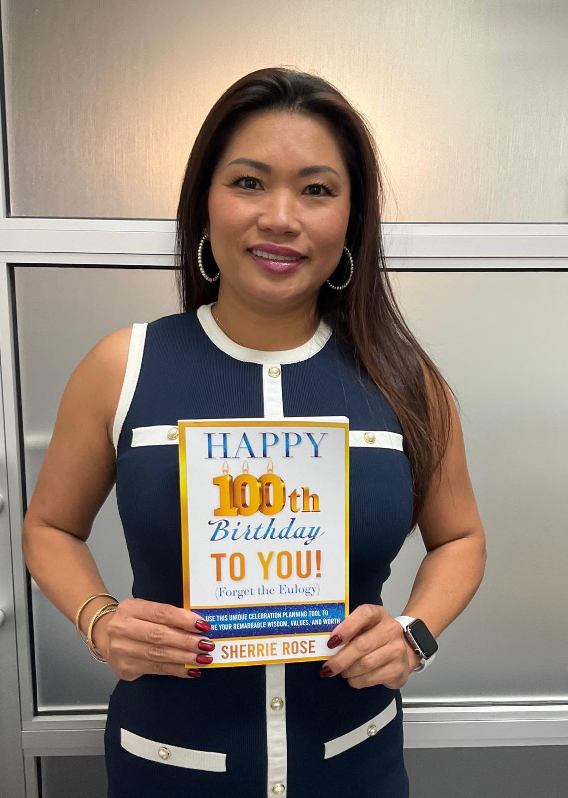 A reader with Happy 100th Birthday to You by Sherrie Rose