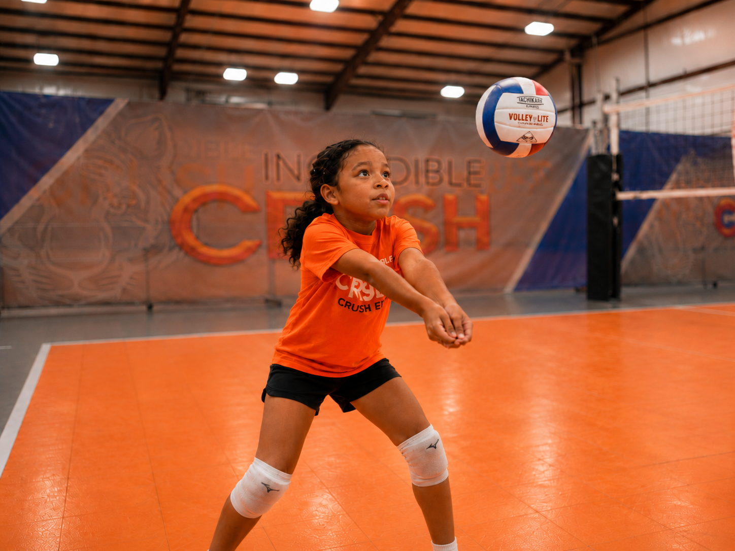 Young player learning volleyball basics