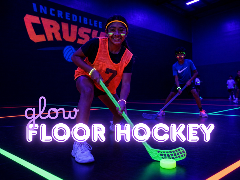 Kids playing floor hockey at Incredible Crush birthday party in Rockwall TX