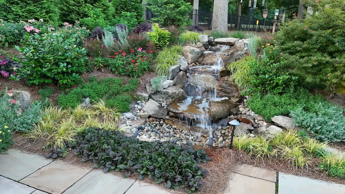 Custom water feature and garden plantings