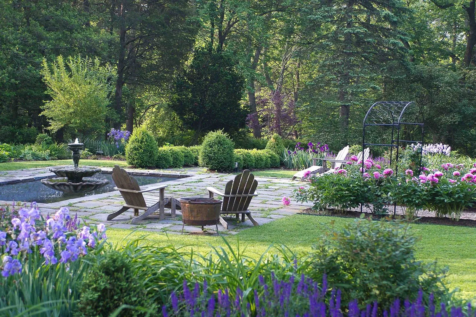 Garden fountain and shaded seating area