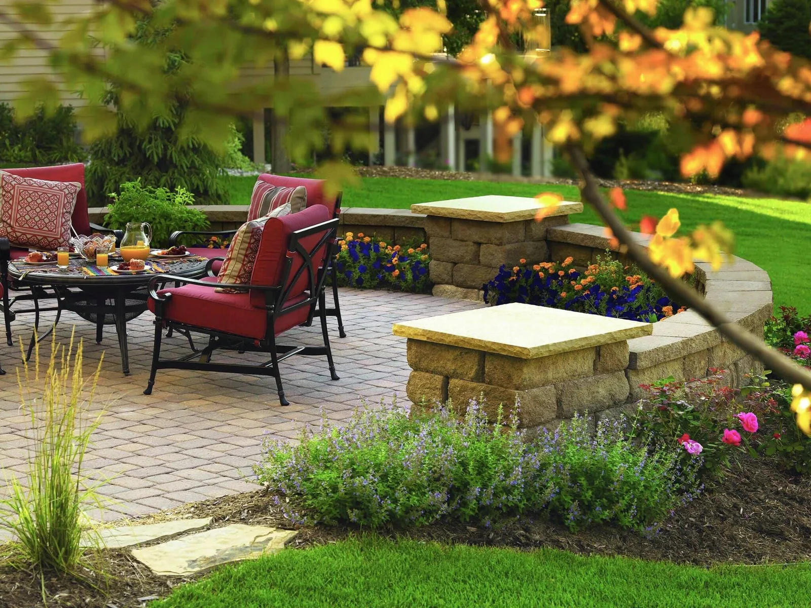 Paver patio with seating wall and landscape beds