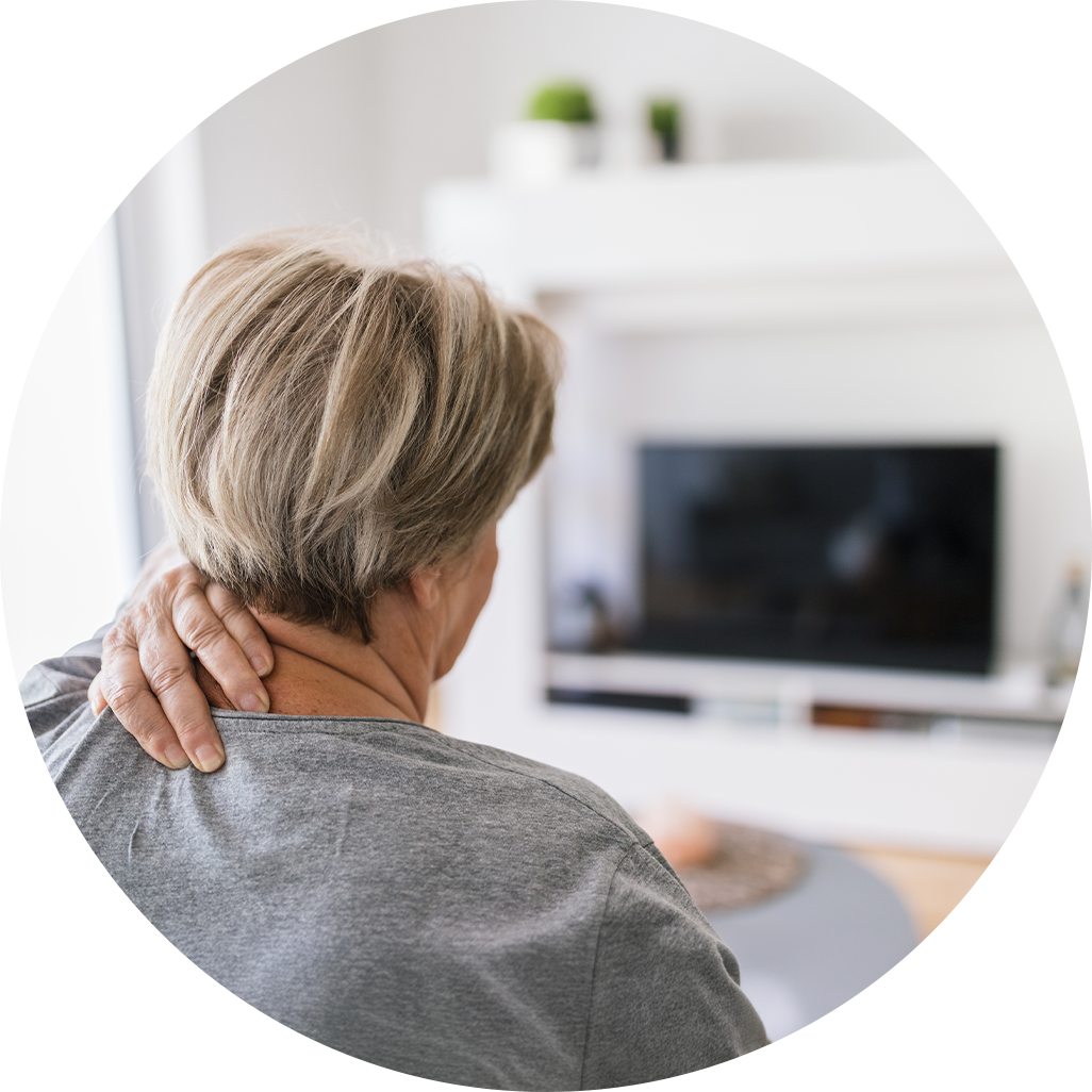 Person watching tv on the couch after an injury Person watching tv on the couch after an injury