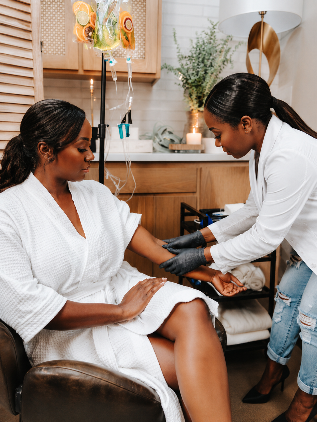 RX3 nurse practitioner providing calm in-home IV hydration to a client