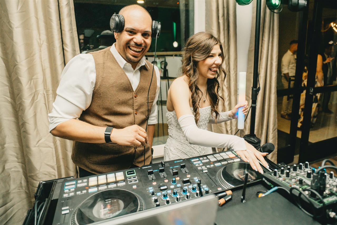 A GTE Event Group DJ at the booth during a wedding reception