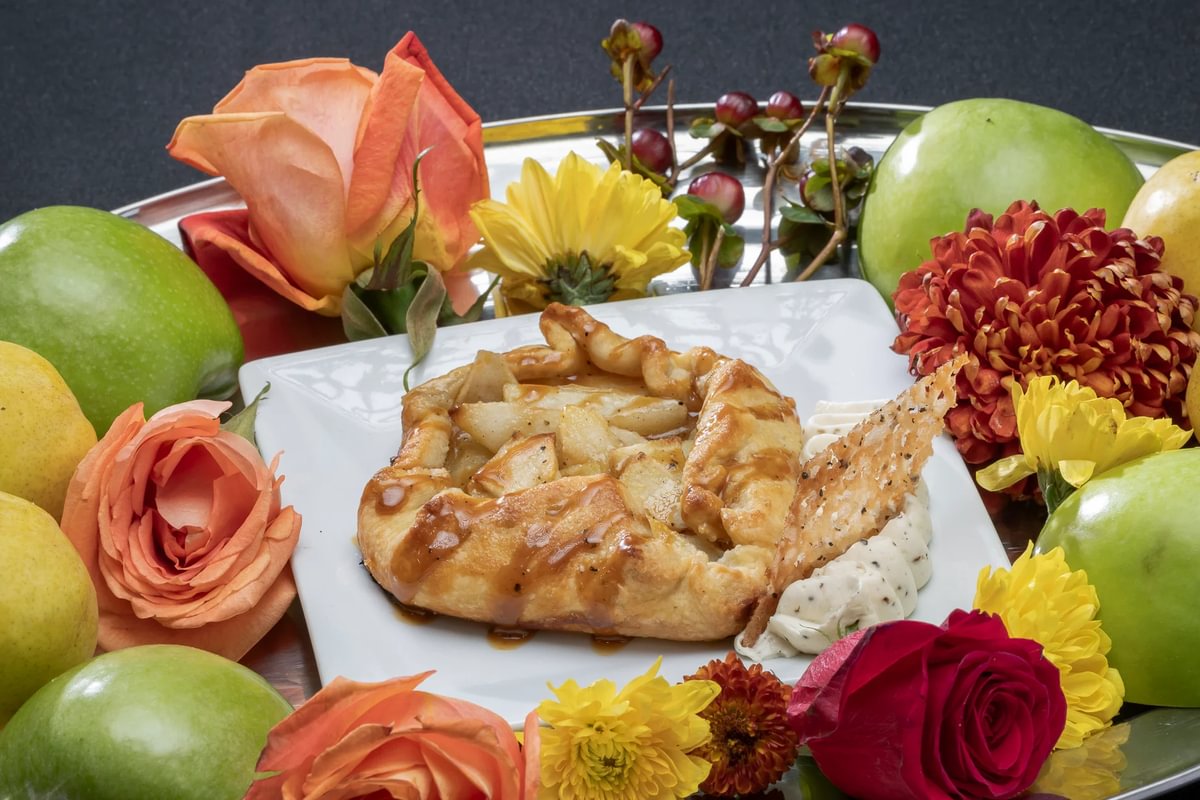 Chocolate cannoli dessert with flowers