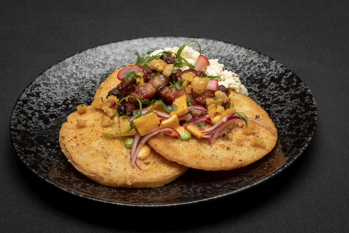 Bacon arepas with corn and cheese