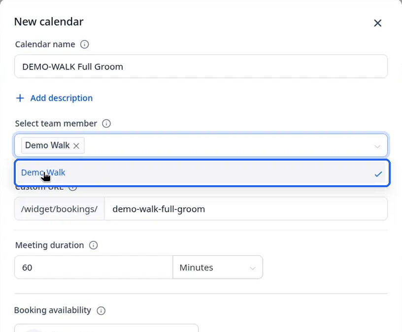 The Select team member dropdown open, showing a team member to choose