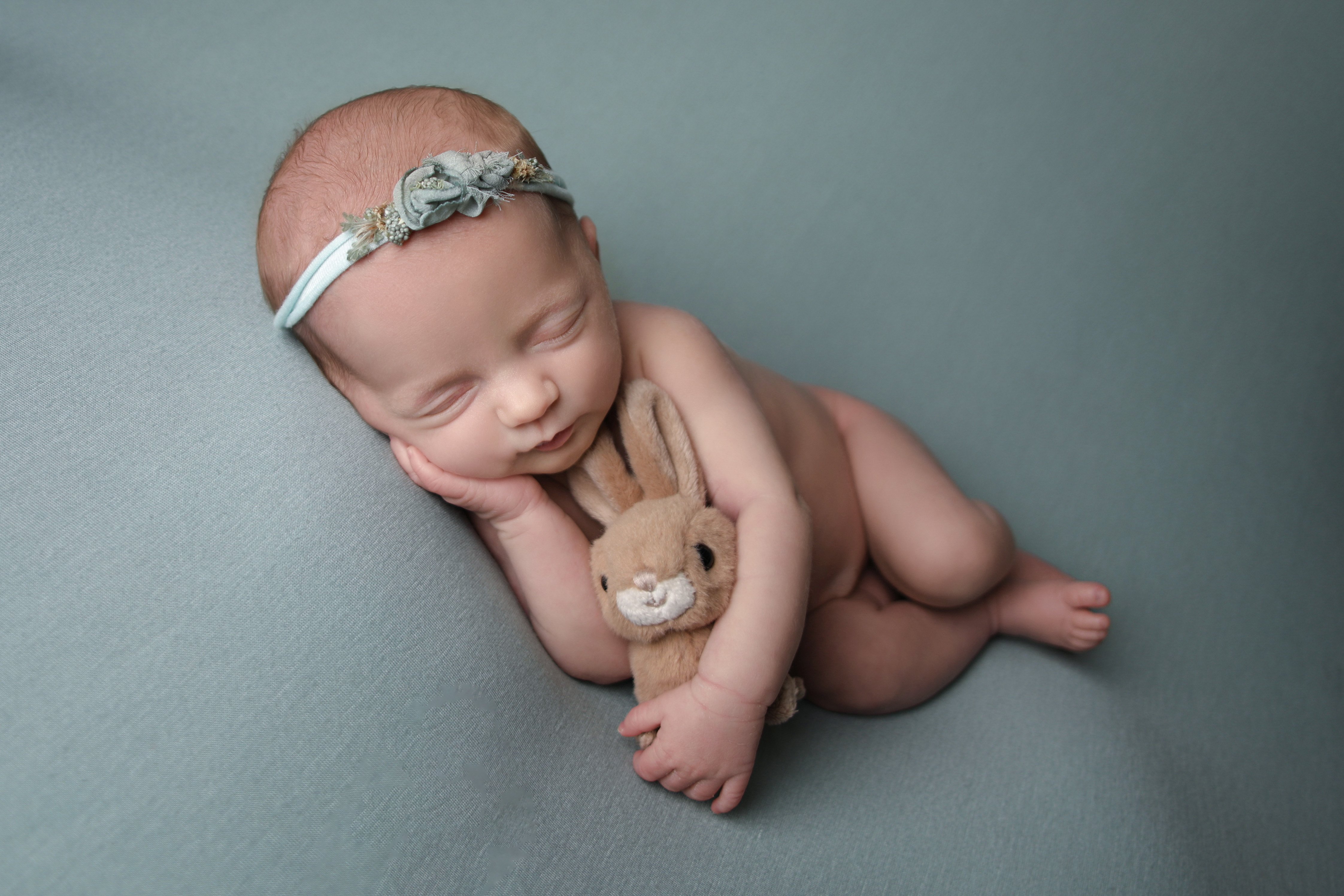 Baby sleeping with toy bunny - Professional baby photos taken by baby art Manchester