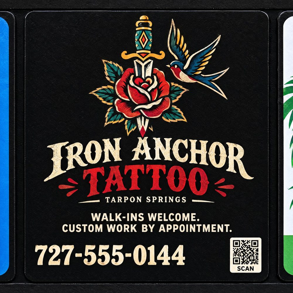 An edgy sponsor ad panel for a tattoo shop on a StreetSpan board, with traditional flash artwork