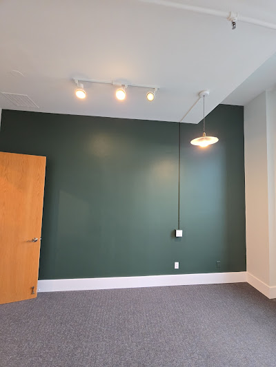 Modern Office Interior Refresh with Green Accent Wall