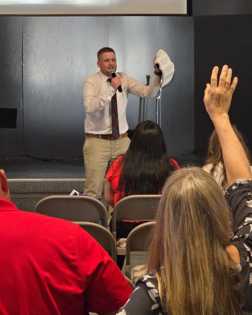 Ev. Dennis Gingerich preaching