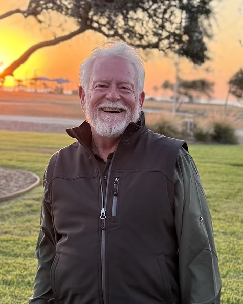 Ed Dolphin, ISA Certified Arborist, outdoors at sunset
