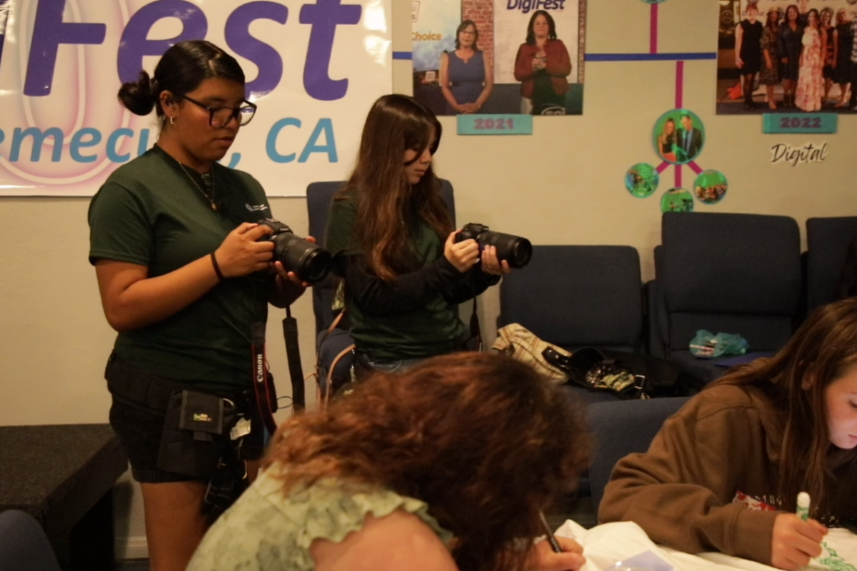 HUSD students are filming and collaborating during a hands-on documentary filmmaking session with JDS Creative Academy.