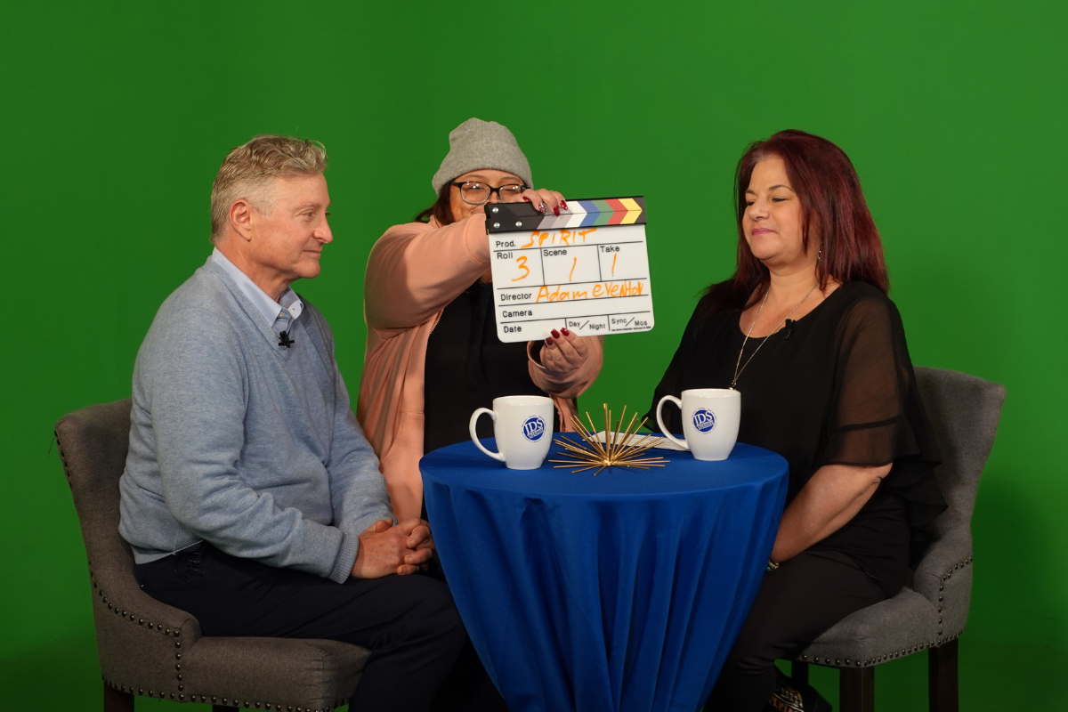 An entrepreneur confidently speaking on camera during a professional branding and media experience at JDS Studio.