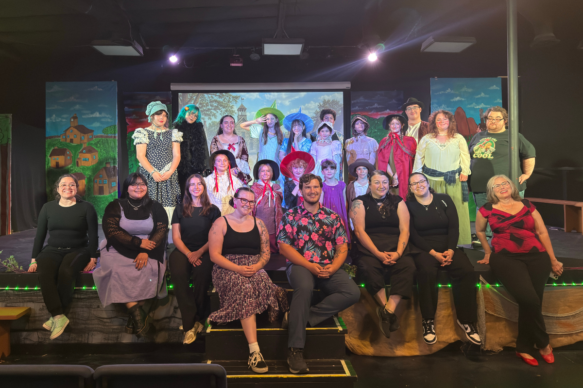 A diverse group of actors, filmmakers, and creatives collaborating in an inclusive production environment where individuals of all abilities work together.