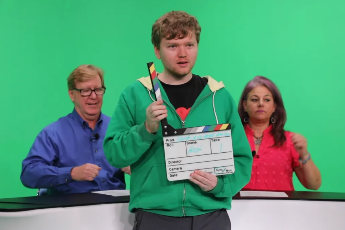 A diverse group of students collaborating on a creative arts project, expressing themselves through visual and performing arts in an inclusive learning environment.