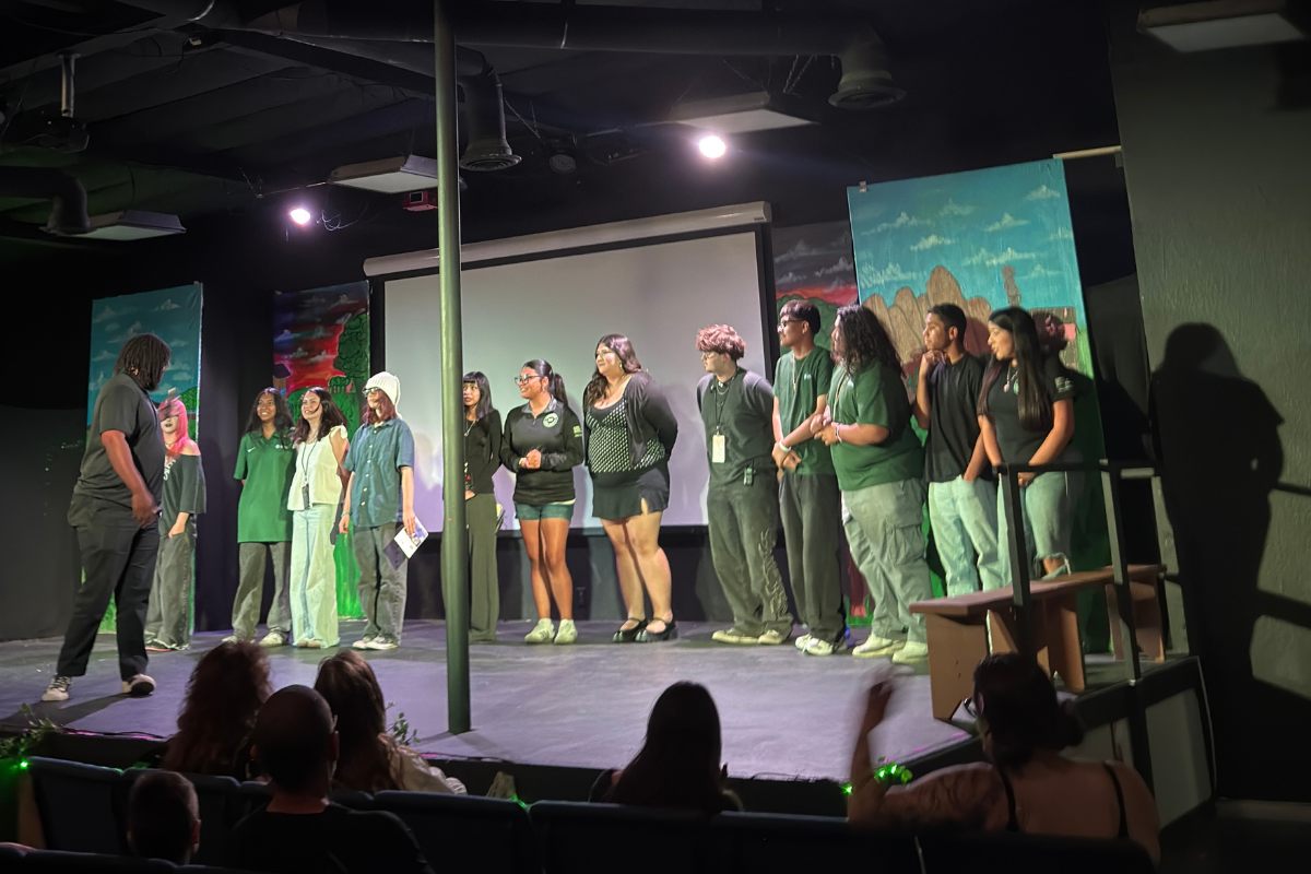 A diverse group of students collaborating on a creative arts project, expressing themselves through visual and performing arts in an inclusive learning environment.