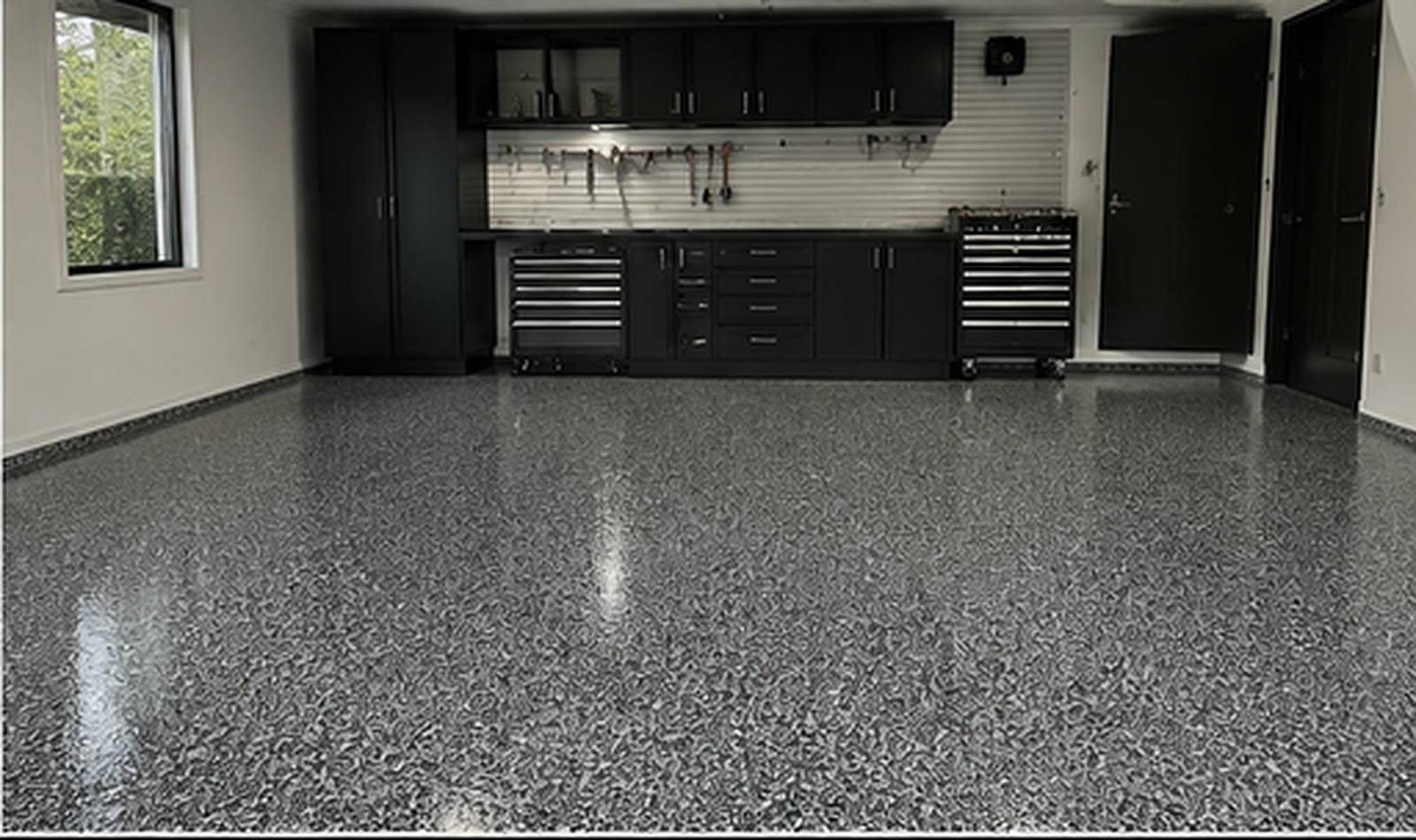 Decorative flake epoxy garage floor by Accredited Epoxy Flooring