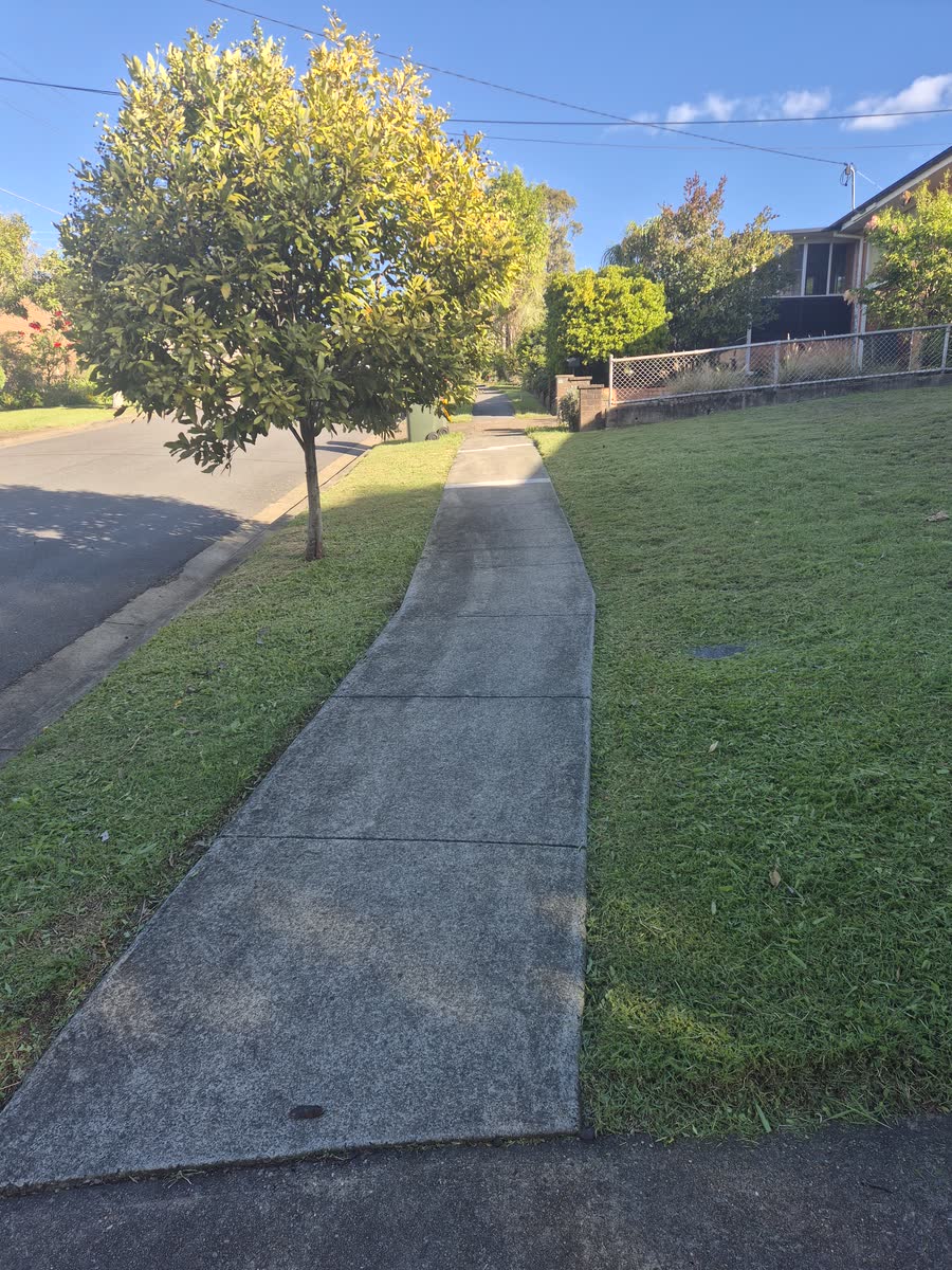 A lawn mowed and edged by John Robert Cleaver in Brisbane South