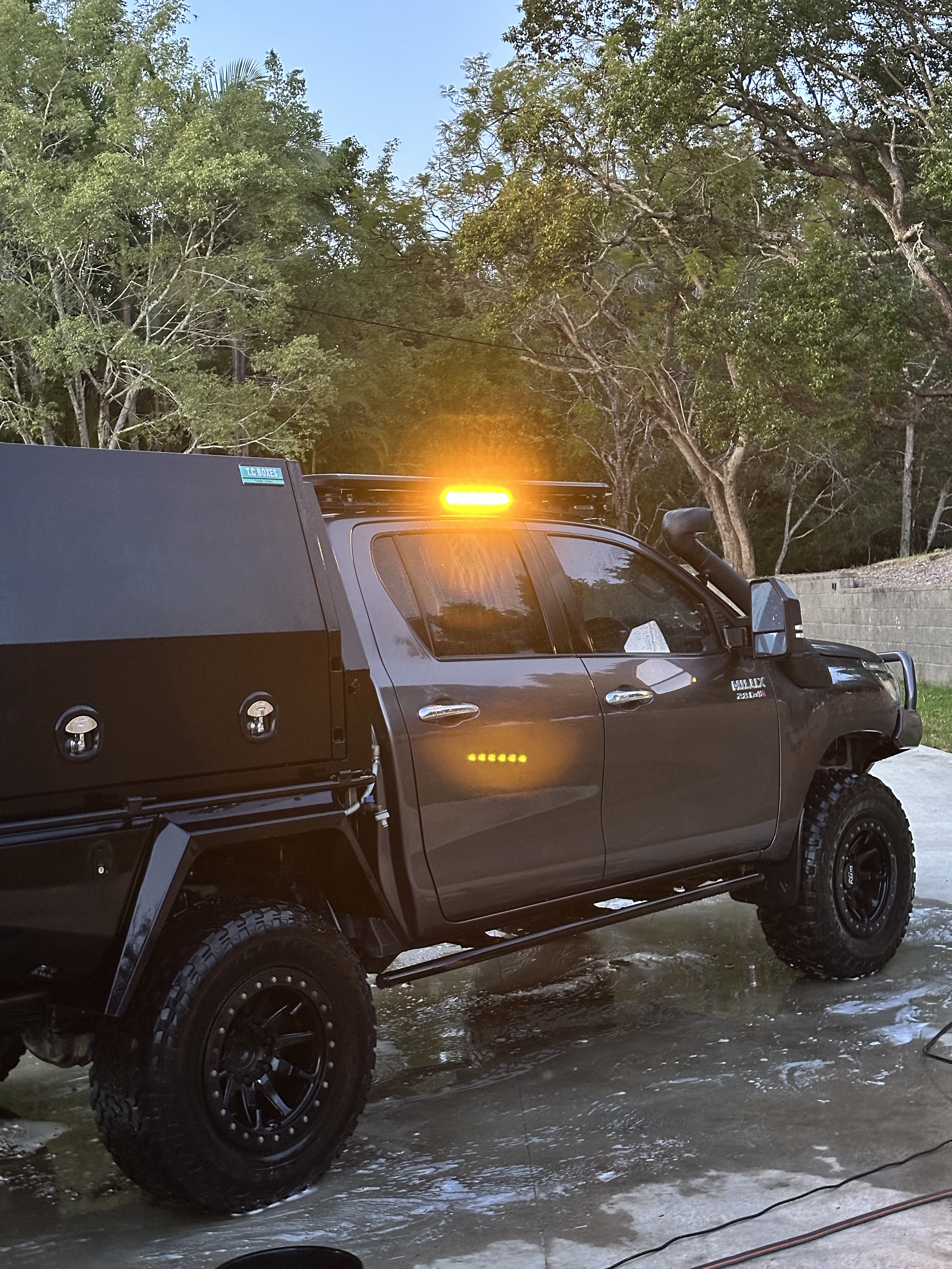 A wet ute after a wash, beading on the paint