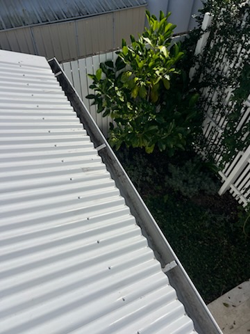 The same gutter cleared out and flowing by First Choice Gutter Services