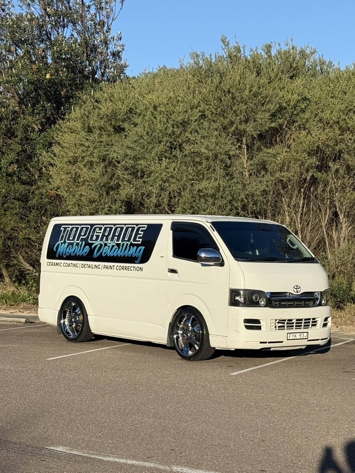 The sign-written Top Grade Mobile Detailing work van