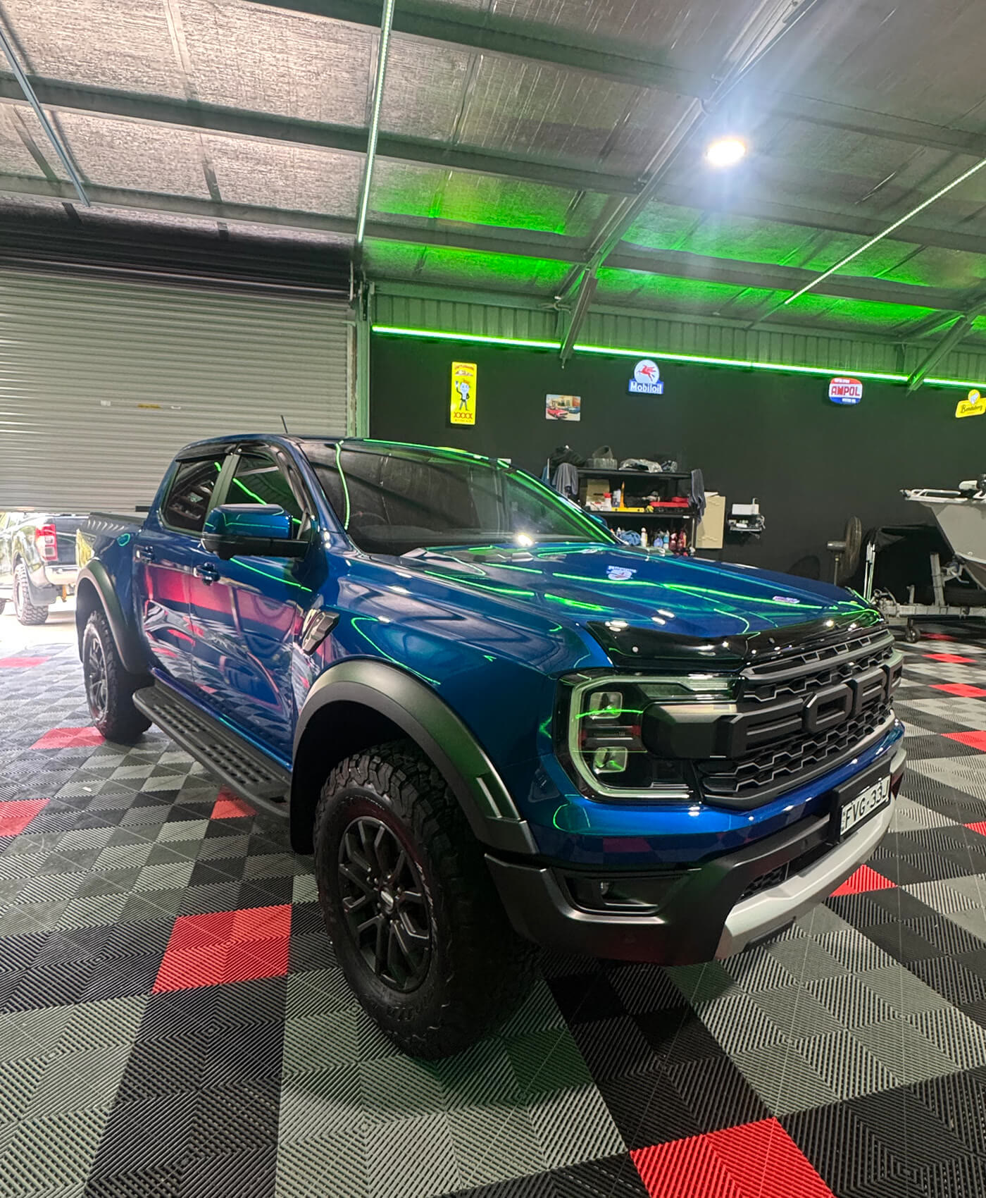 Ford Ranger Raptor under the workshop lights